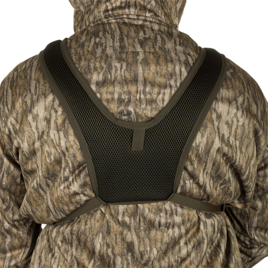 Run-N-Gun Turkey Chest Pack with camouflage design, featuring multiple pockets, removable bino harness, and stowable rain fly, ideal for hunting adventures.