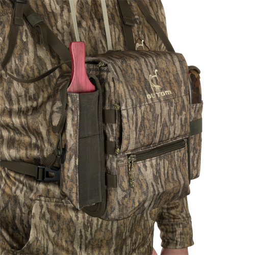 Run-N-Gun Turkey Chest Pack in camouflage, featuring multiple pockets, detachable bino harness, and a stowable rain fly, ideal for hunting trips.