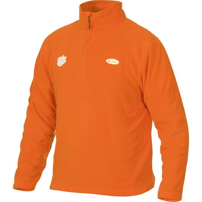 Clemson Camp Fleece 1/4 Zip Pullover with Tiger Paw logo. Midweight micro-fleece for fall layering. Moisture-wicking, anti-pill finish. Ideal for hunting and outdoor activities.