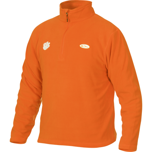 Clemson Camp Fleece 1/4 Zip Pullover with Tiger Paw logo. Midweight micro-fleece for fall layering. Moisture-wicking, anti-pill finish. Ideal for hunting and outdoor activities.