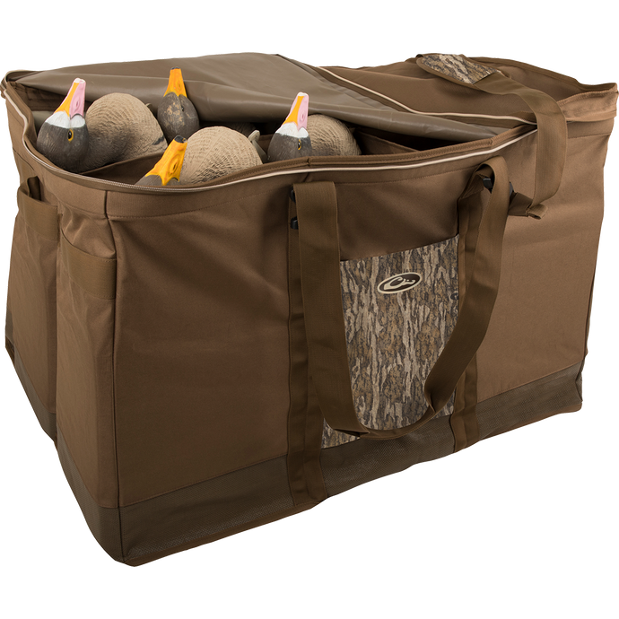 A rugged 6 Slot Zippered-Top Decoy Bag with duck decoys inside. Carry all your decoys in one bag with padded shoulder strap and integrated pocket.