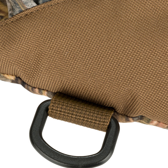 Close-up of the LST Handwarmer Muff showcasing its plush fleece lining and front storage pocket with a see-through waterproof cell phone pouch.