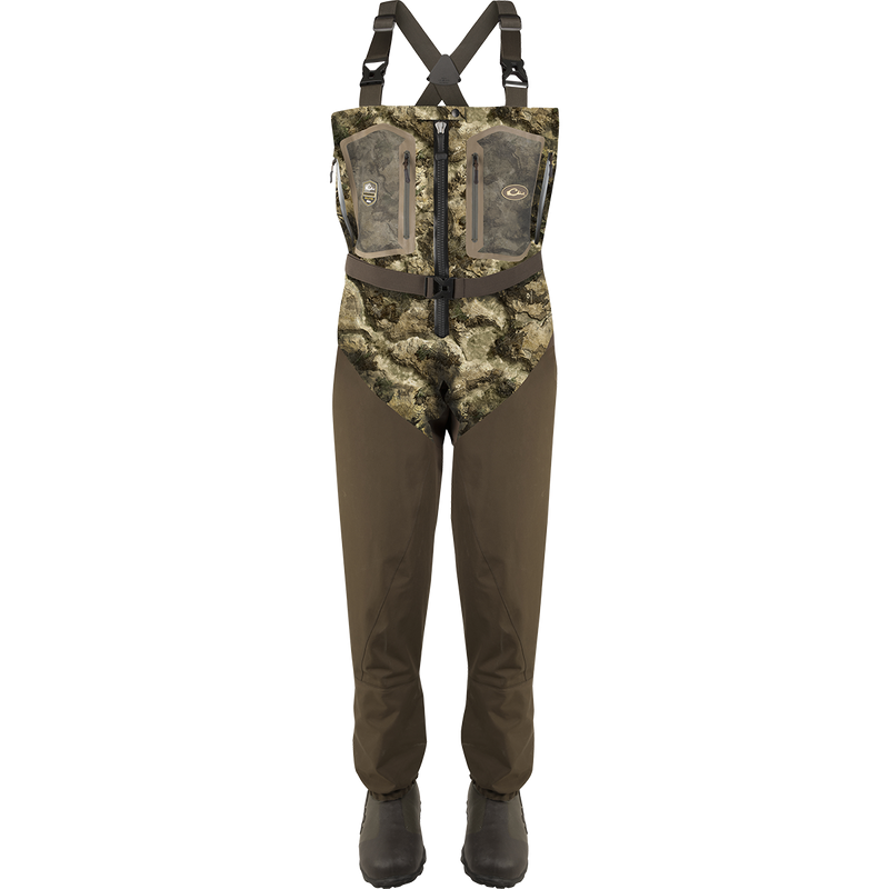 Front Zip Guardian Elite 4-Layer Wader w/ Tear-Away Liner [Stout] featuring camouflage overalls, black zipper, and robust boots with black soles.