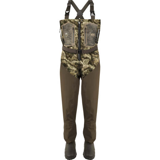 Front Zip Guardian Elite 4-Layer Wader w/ Tear-Away Liner [Stout] featuring camouflage overalls, black zipper, and robust boots with black soles.