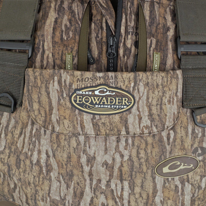 Close-up of the Youth Eqwader 1600 Breathable Wader with Tear-Away Liner, highlighting the durable fabric, zippered pouch, and reinforced seams for young hunters.