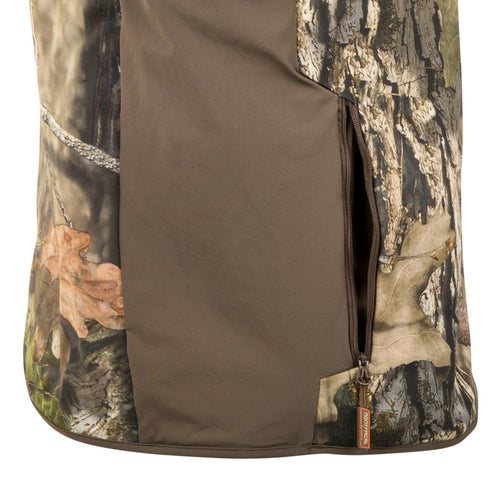 Close-up of the Camo Tech Vest with Agion Active XL zipper and chest pockets, showcasing detailed craftsmanship and functionality for hunting activities.