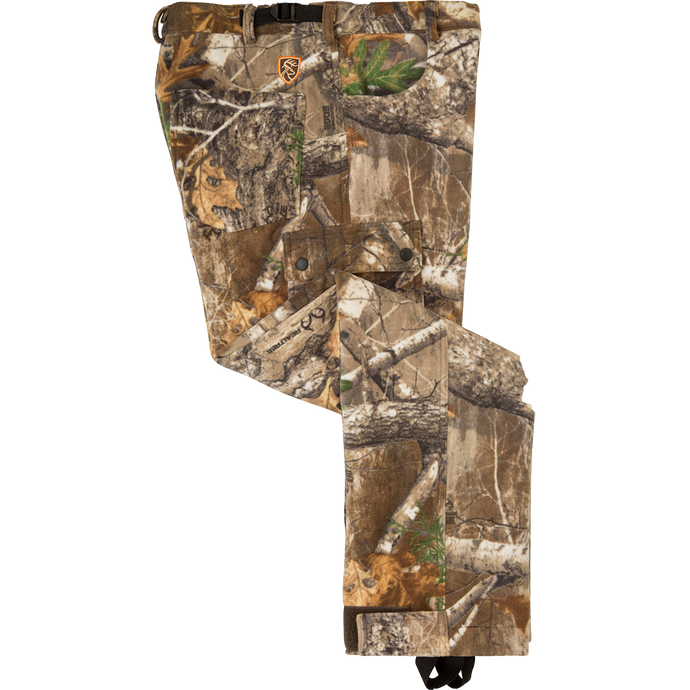 Silencer Windproof Fleece Pant with Agion Active XL™- Realtree Edge, featuring camouflage pattern, multiple pockets, and adjustable ankle straps, designed for hunting in cold, windy conditions.