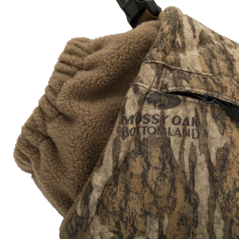 Close-up of Handwarmer Muff with Agion Active XL showing waist belt stretch panel and front storage pocket.