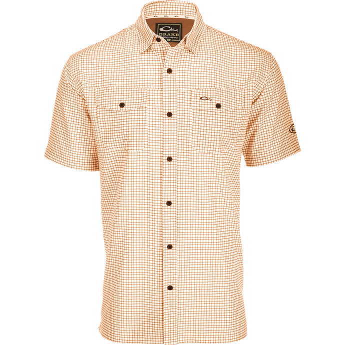 Traveler's Minigrid Short Sleeve Shirt with Four Way Stretch and split tail hem for comfort and style. Lightweight, wrinkle-resistant fabric.