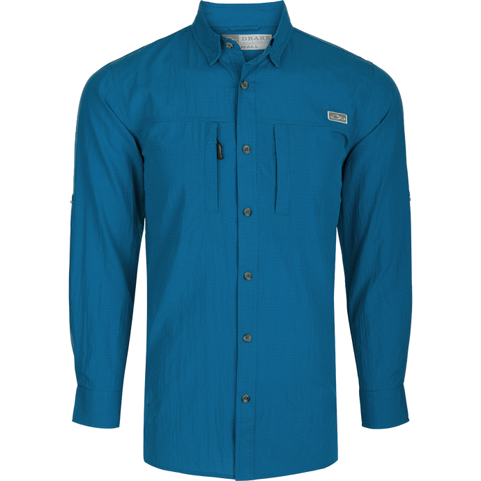 Classic Seersucker Minicheck Shirt L/S: A blue shirt with long sleeves, button-down collar, hidden zippered chest pocket, and Magnattach™ closure. Vented cape back and split tail hem for added ventilation and versatility.