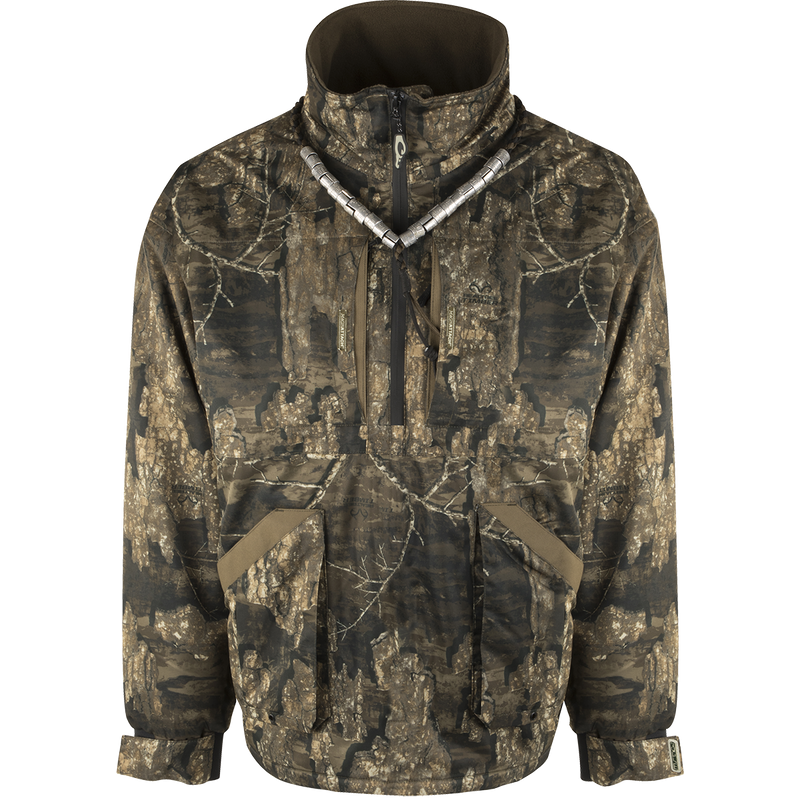 MST Refuge 3.0 Fleece-Lined 1/4 Zip Jacket - Realtree Timber, featuring camouflage pattern, zippered closure, and durable, waterproof fabric designed for hunting in various conditions.