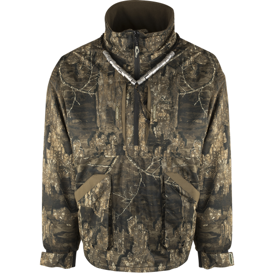 MST Refuge 3.0 Fleece-Lined 1/4 Zip Jacket - Realtree Timber, featuring camouflage pattern, zippered closure, and durable, waterproof fabric designed for hunting in various conditions.