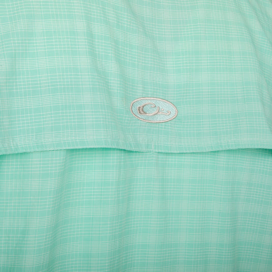 Close-up of the Wingshooter's Plaid Sun Shirt L/S, showcasing the green and white plaid fabric with UPF 50+ protection and front heat vents.