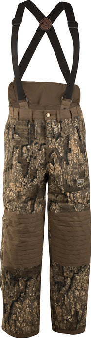 Guardian Elite™ High-Back Hunt Pant - Fleece-Lined camouflage shorts with reinforced knees, zippered pockets, and removable suspenders for cold-weather hunting. Final Sale, no returns or exchanges.