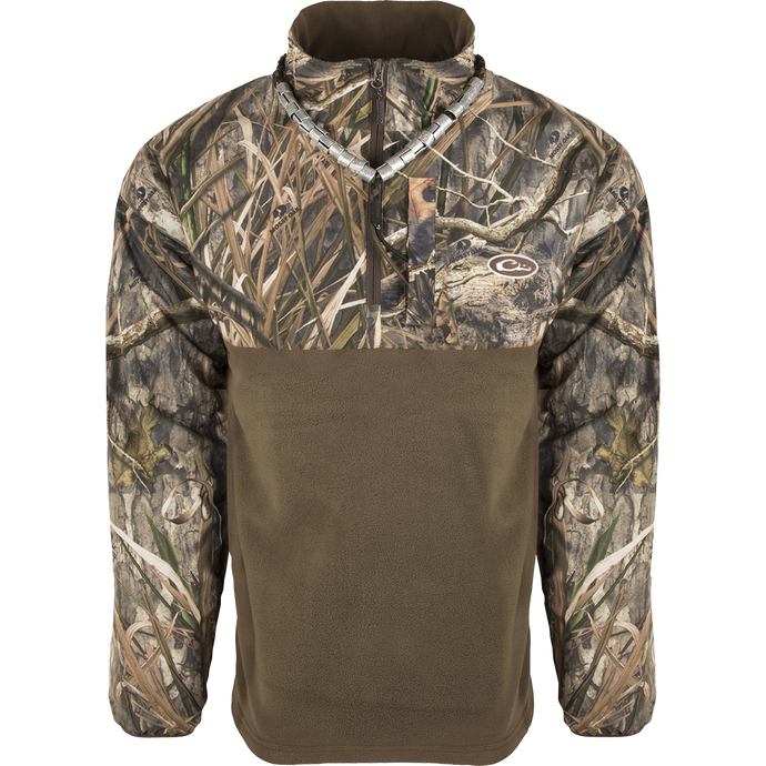 A camouflage jacket with innovative features and advanced fabrics, MST 1/4 Zip Refuge Eqwader Pullover from Drake Waterfowl. Waterproof, windproof, and breathable, perfect for waterfowl hunting.