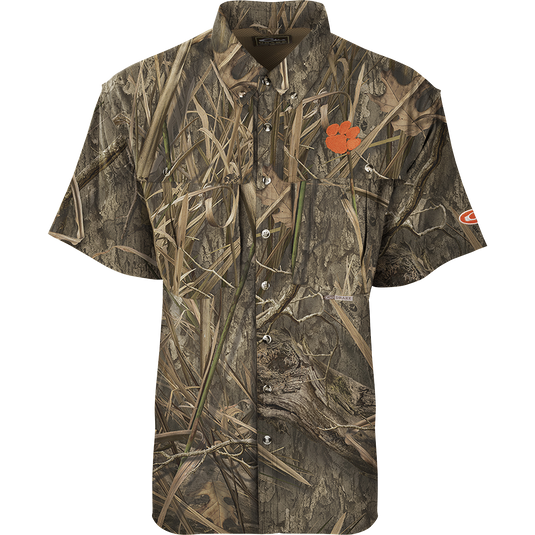 Clemson S/S Flyweight Wingshooter: Camouflage shirt with flower, lightweight polyester, vented back, moisture-wicking, UPF 50+, chest pockets, designed for warm-weather outdoor activities.