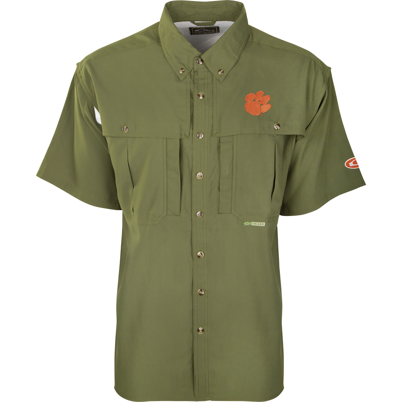 Clemson S/S Flyweight Wingshooter: Green shirt with vented back, quick-drying Flyweight polyester, UPF 50+ sun protection, Magnattach chest pocket, and vertical zipper pocket. Designed for warm-weather outdoor activities.