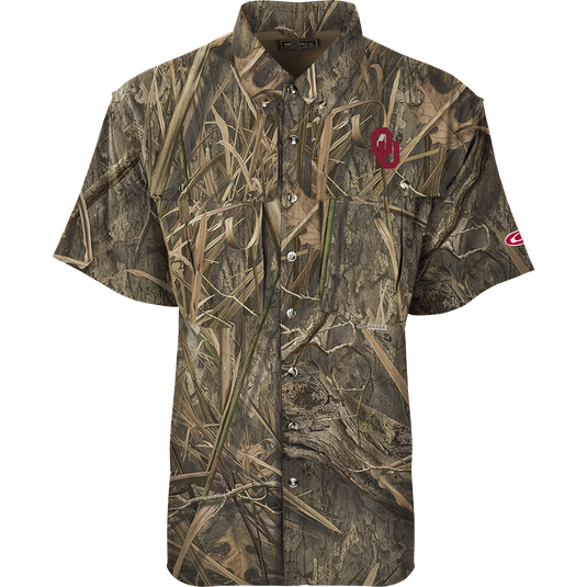 Oklahoma S/S Flyweight Wingshooter camouflage shirt with logo, featuring vented back, quick-drying fabric, UPF 50+ protection, and multiple functional pockets for warm-weather outdoor activities.