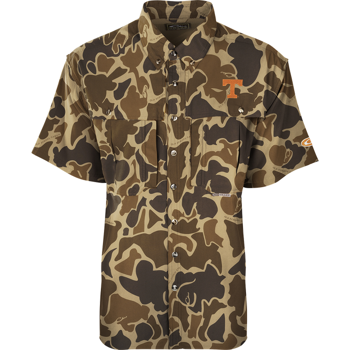 Tennessee S/S Flyweight Wingshooter: A lightweight, breathable camouflage shirt with logo. Quick-drying, moisture-wicking fabric with UPF 50+ sun protection. Vented back design, chest pockets, and a vertical zipper pocket. Ideal for warm-weather outdoor activities.